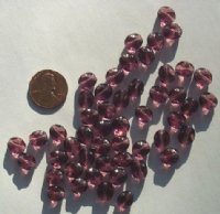 50 8-9mm Dented Twisted Ovals - Amethyst